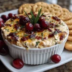 Close-up slight angle of comforting Cranberry Jalapeño Dip on white plate