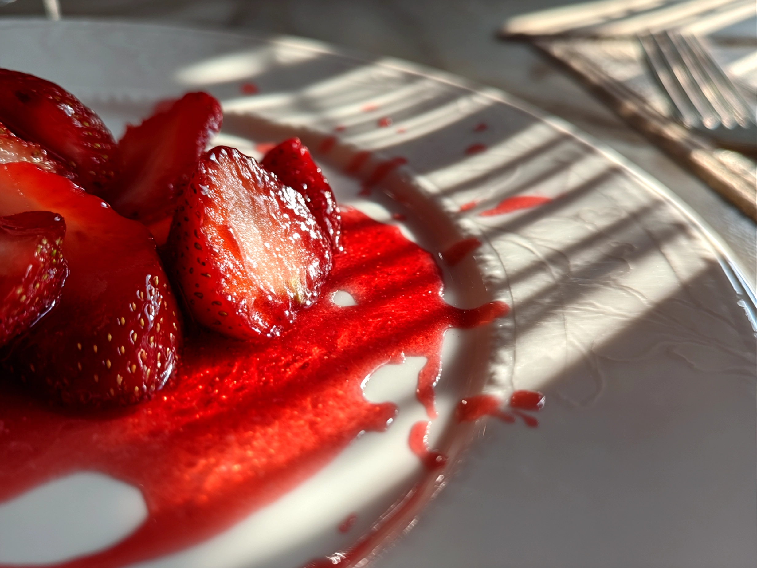 Close-up of finished refreshing strawberry daiquiri taken with iPhone 16 Pro