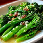 Freshly prepared Copycat Longhorn Broccoli on white plate