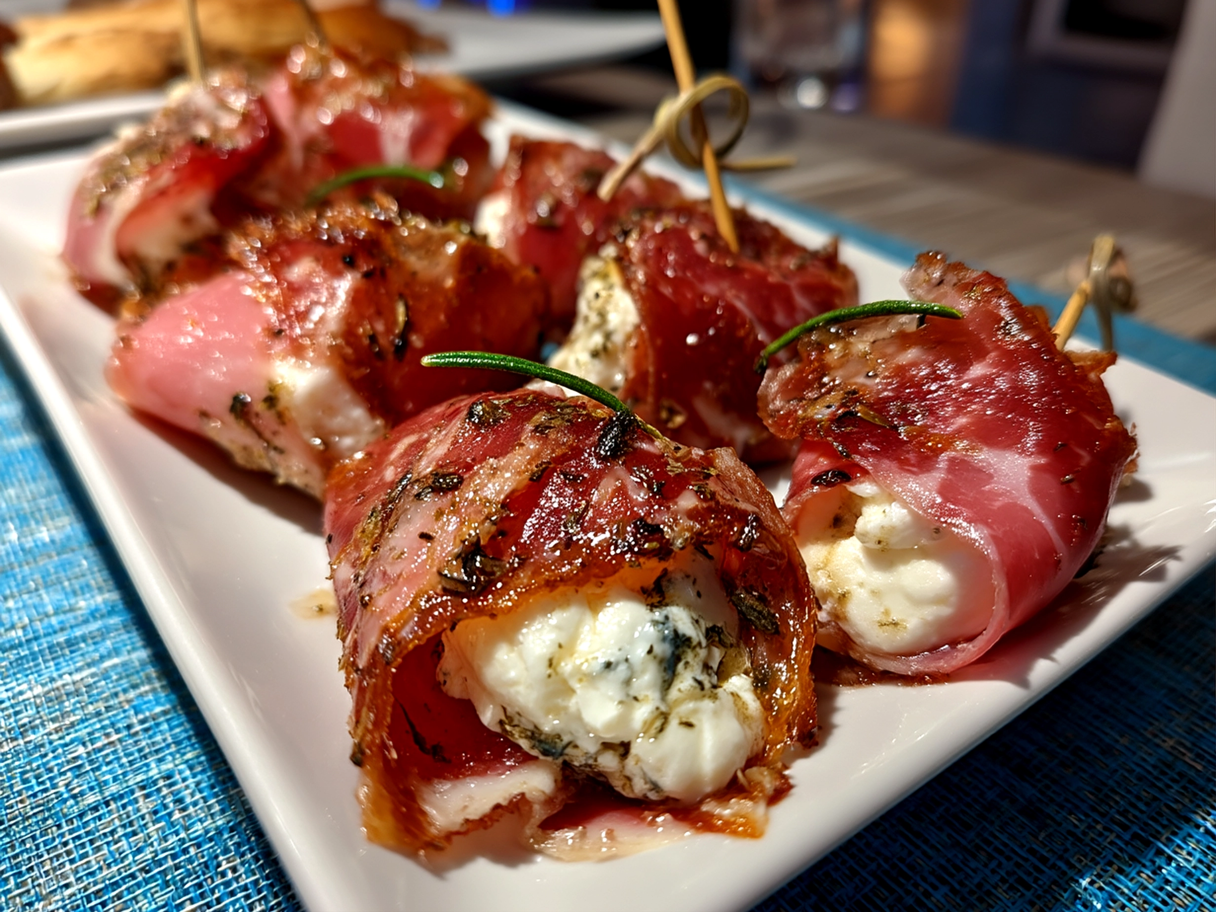 Slight angle close up of finished delicious Prosciutto Wrapped Mozzarella Bites